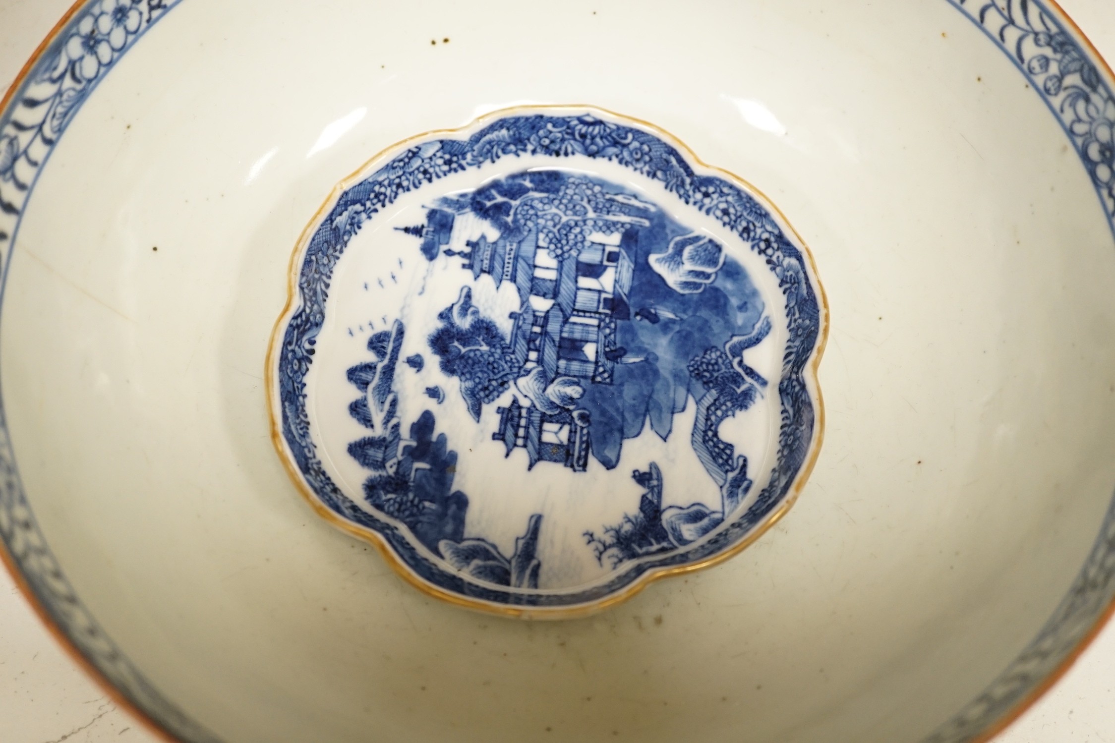 A selection of 18th century blue and white Chinese export bowls and dishes, largest 31cm diameter